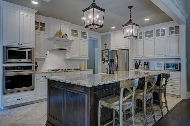 Upscale white kitchen with island