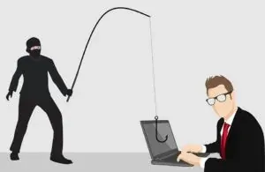 Phishing thief cartoon with laptop