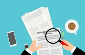 Illustration documents magnifier coffee desk