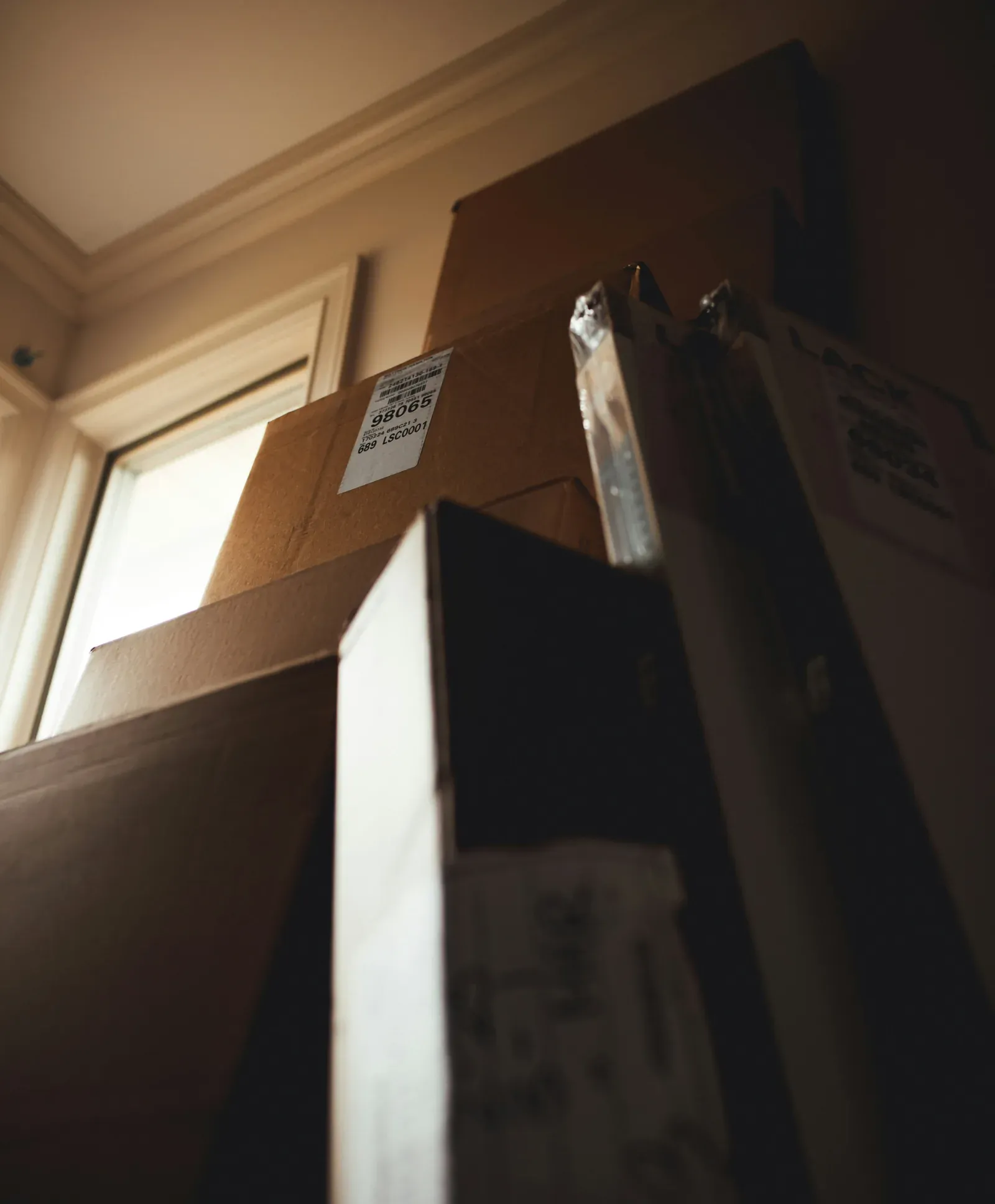 Stacked cardboard boxes indoors