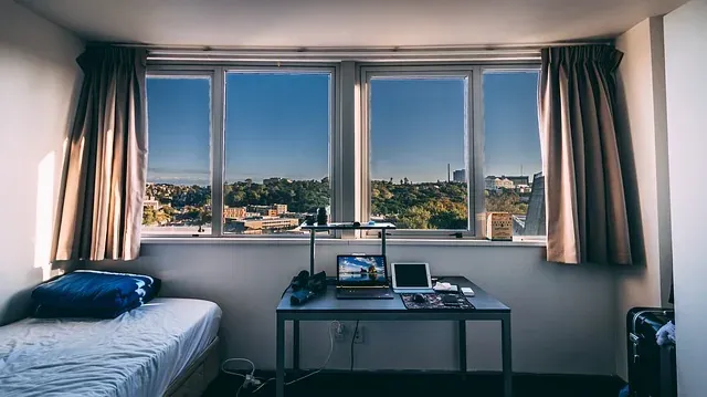 Bedroom with desk and window view