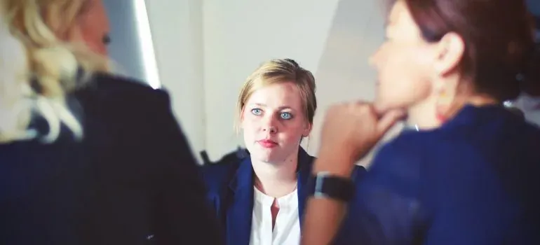 Business meeting, three women talking