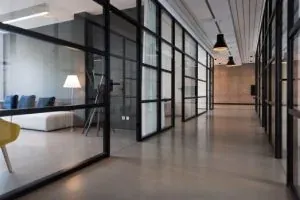 Modern office glass-walled hallway