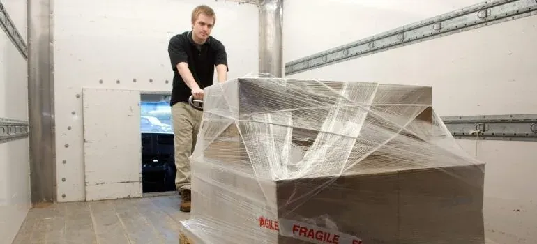 Movers loading boxes into a truck in New Jersey