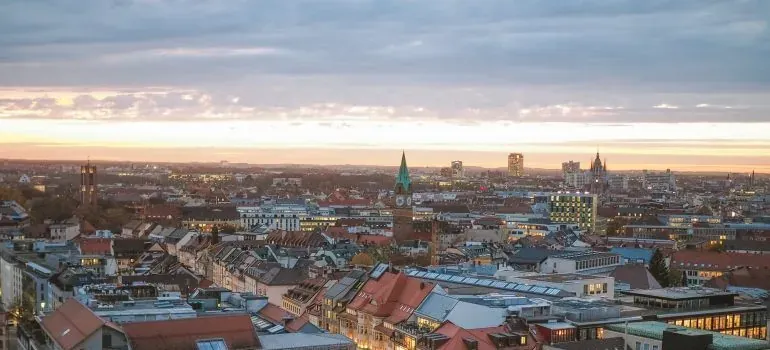 City skyline rooftops at sunset
