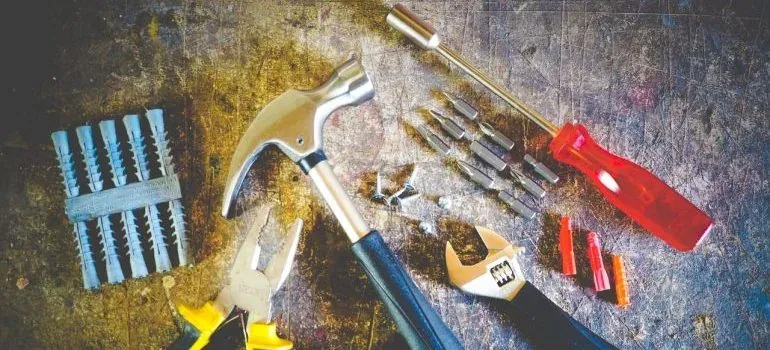 Hand tools flatlay on workbench