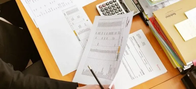 Paperwork, calculator, office desk