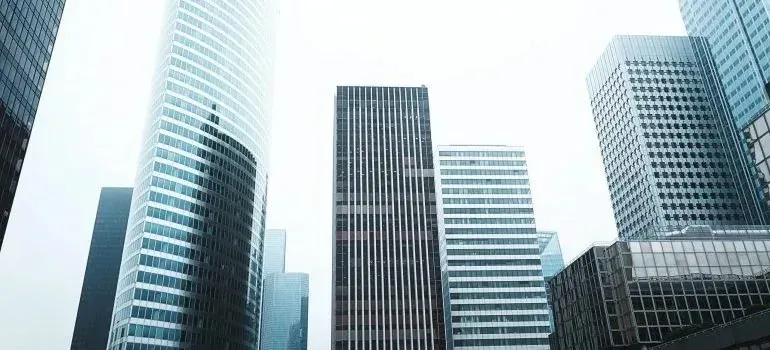 Cluster of high-rise skyscrapers against overcast sky