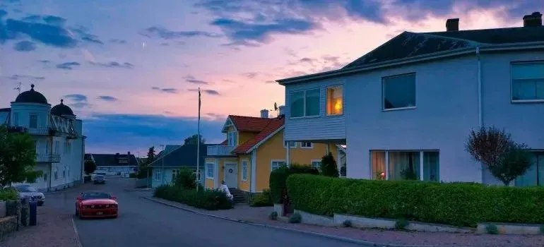 Quiet residential street with houses at dusk