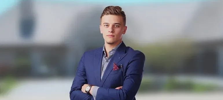 Young businessman in blue suit