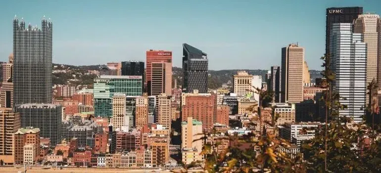 Pittsburgh downtown skyline; incidental UPMC building sign visible