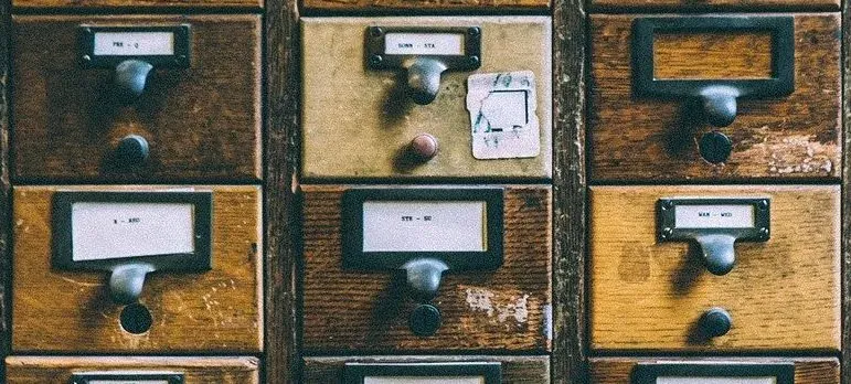 Vintage wooden card catalog drawers