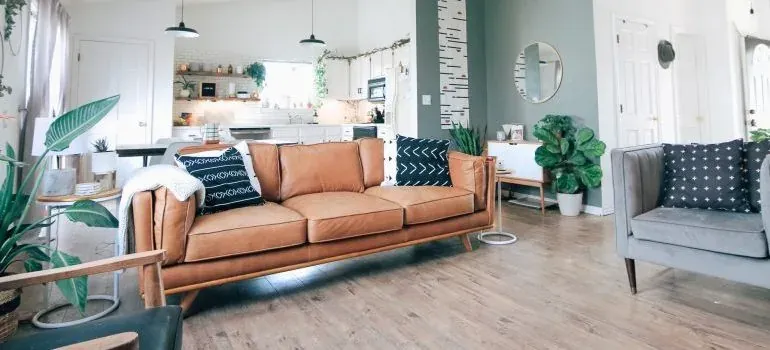 Bright living room with leather sofa