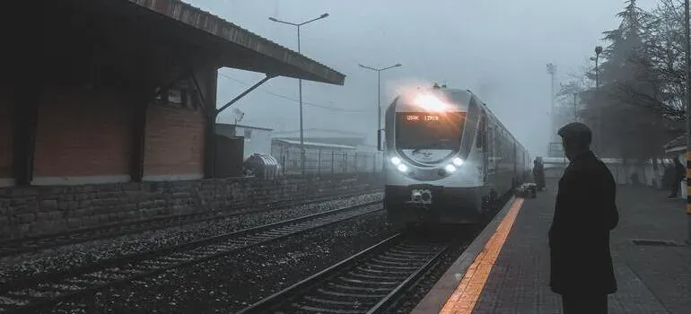 Train arriving at foggy station