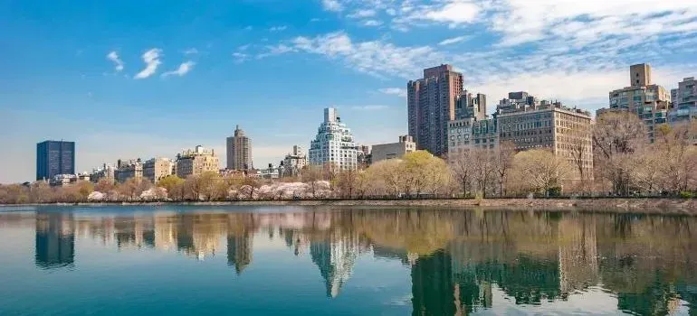 New York skyline reflected in Central Park reservoir