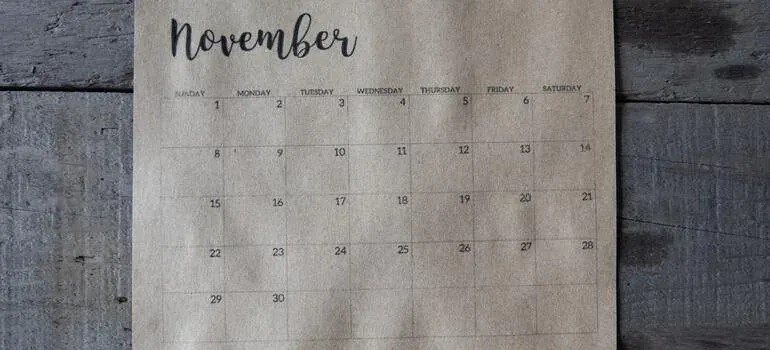 November calendar page on wood