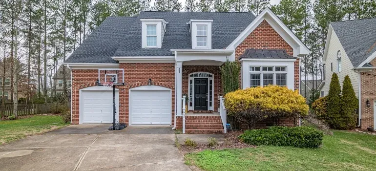 Brick suburban house with garages