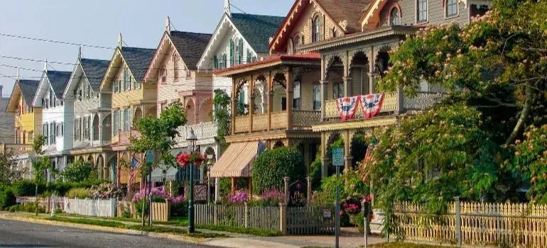 Row of colorful Victorian houses on residential street
