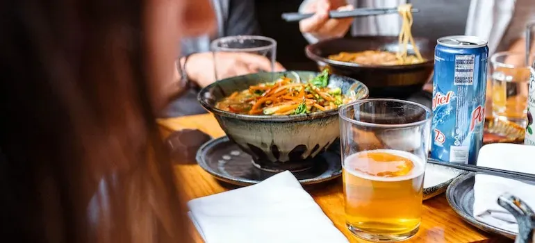 Noodle bowls and beer at restaurant