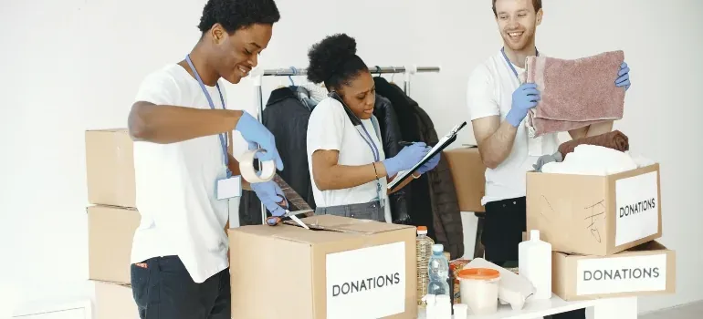 Volunteers packing donation boxes