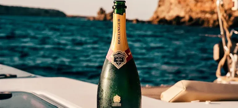 Bollinger champagne bottle on boat; product label only