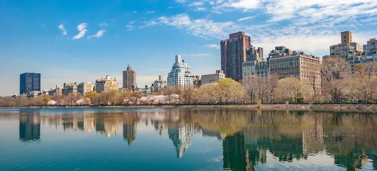 Central Park reservoir and NYC skyline
