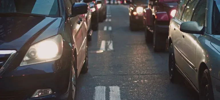 Cars in traffic on street
