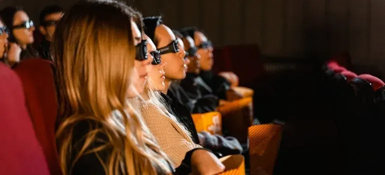 Audience in 3D glasses at cinema