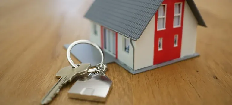 House keys with miniature house model
