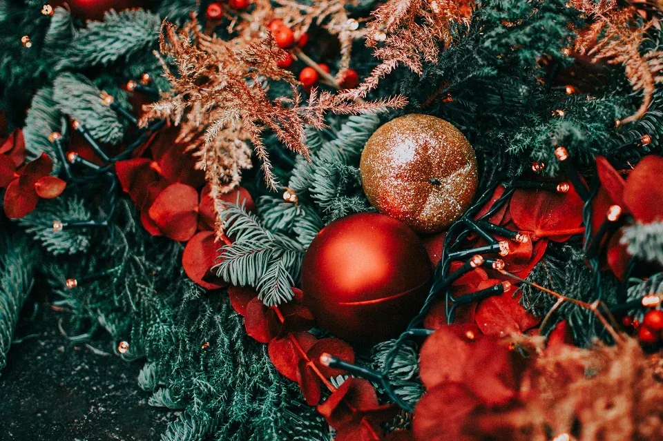 Boxed holiday decorations organized on shelves in a New Jersey home