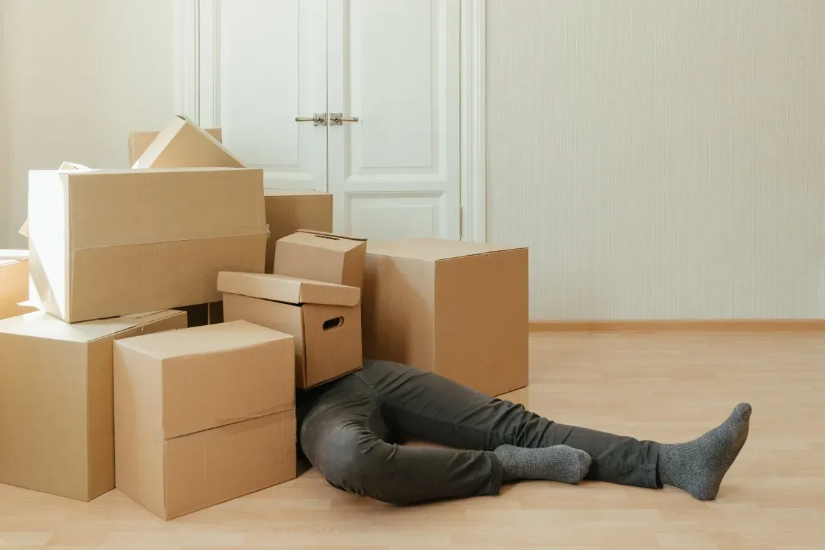 Moving boxes labeled with colored tape stacked in a New Jersey home