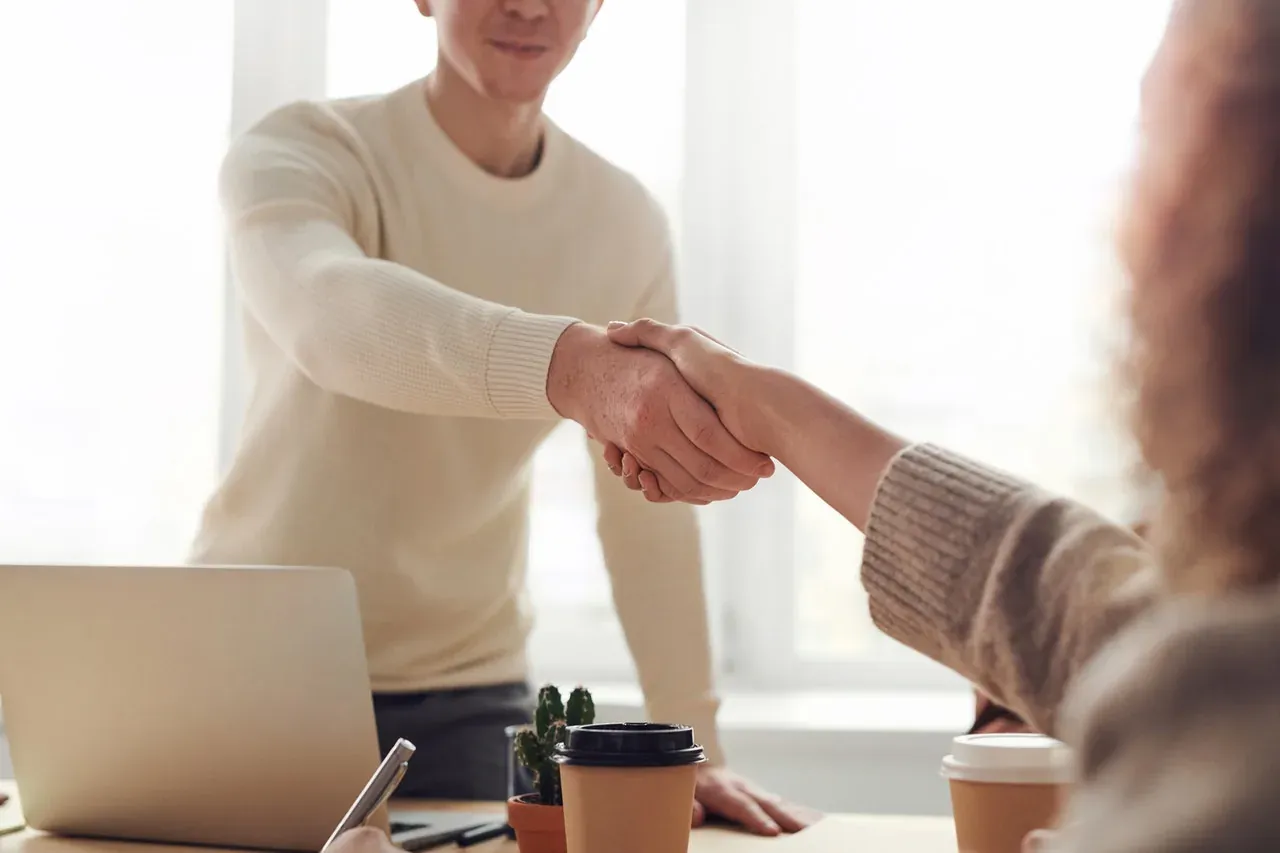 Person reviewing a moving contract before hiring a New Jersey moving crew