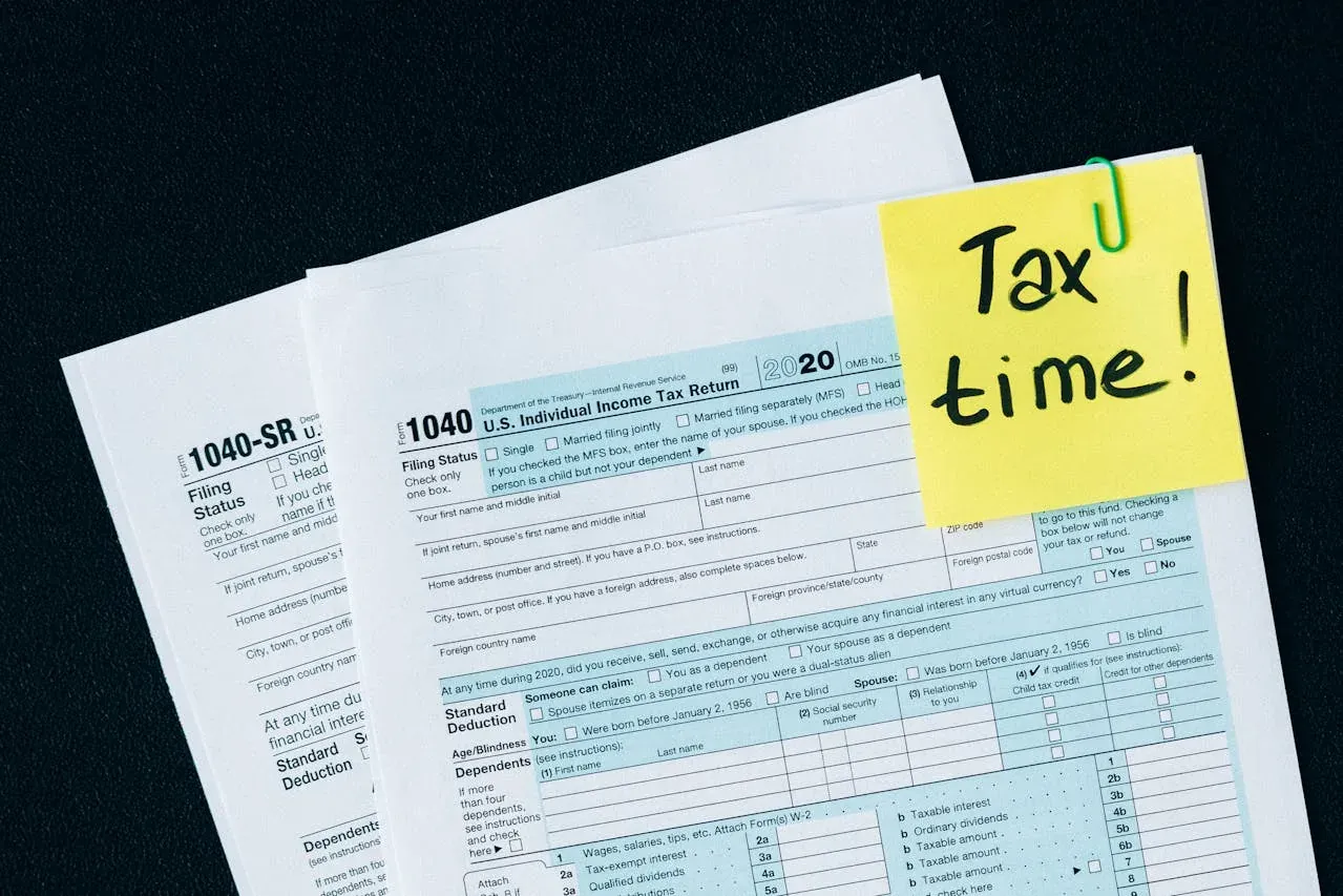 Homeowner reviewing property tax paperwork at a kitchen table in New Jersey