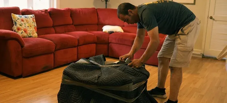 Movers loading boxes into a truck for a long distance move to New Jersey