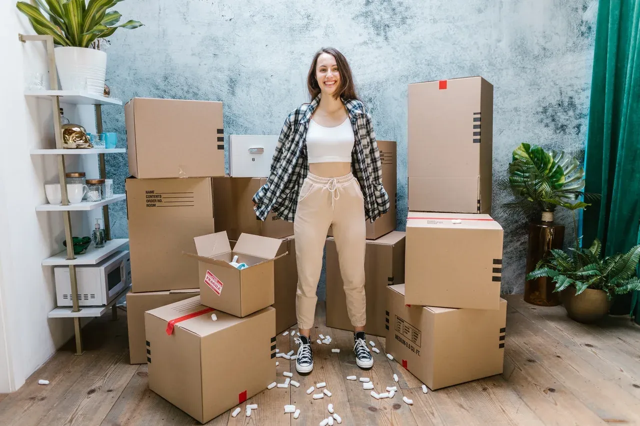 Movers loading packed boxes into a truck in New Jersey
