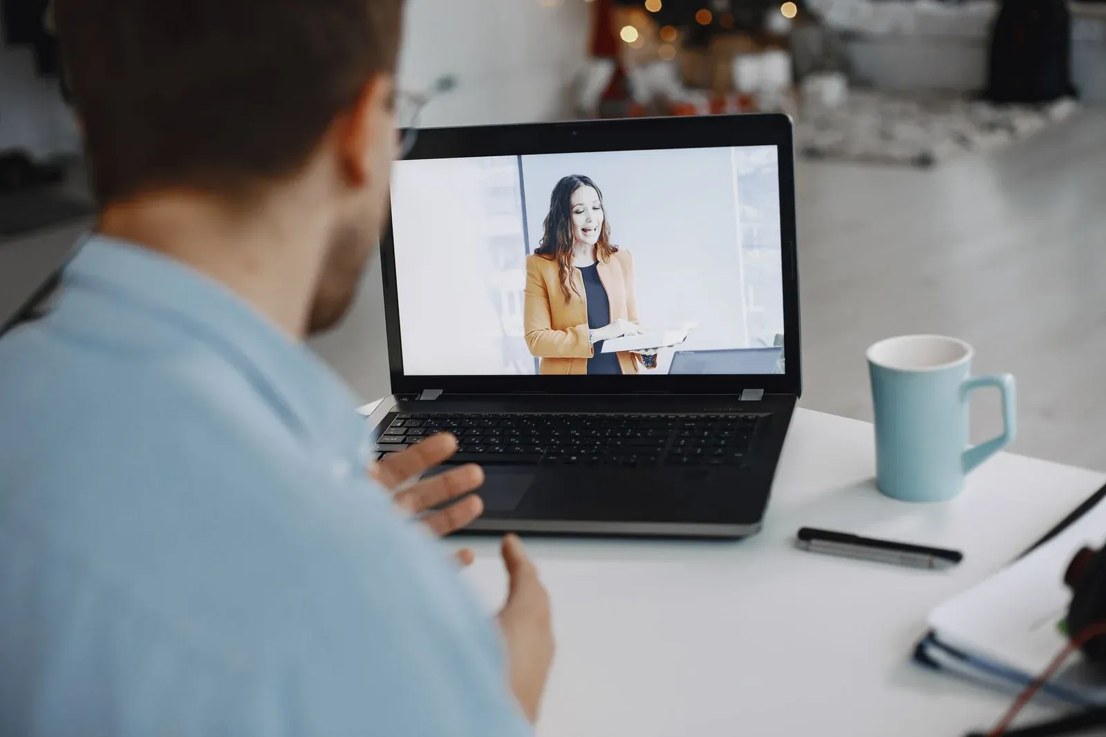 A person on a video call getting a virtual moving estimate at home