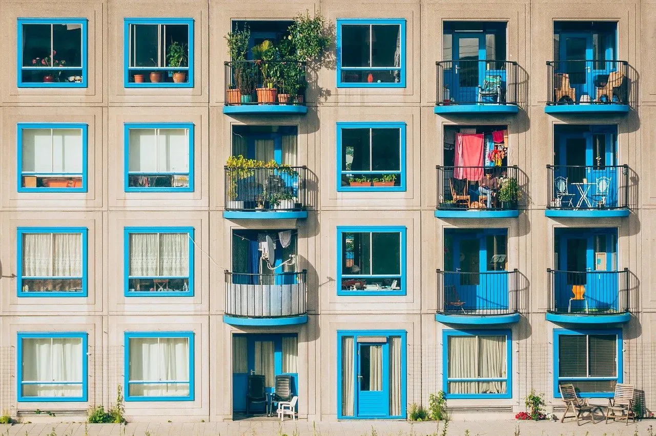 Apartment facade with blue balconies