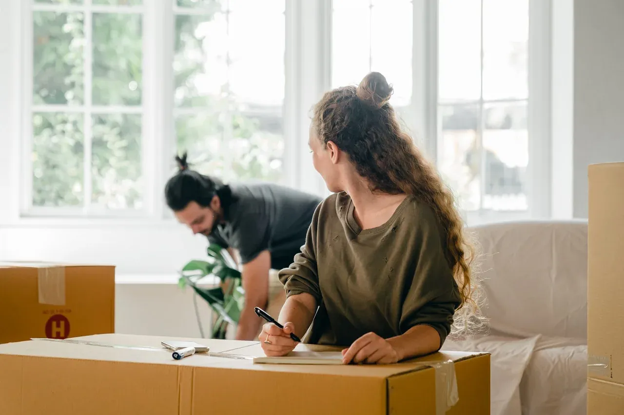 Movers preparing boxes and furniture for a local move in New Jersey