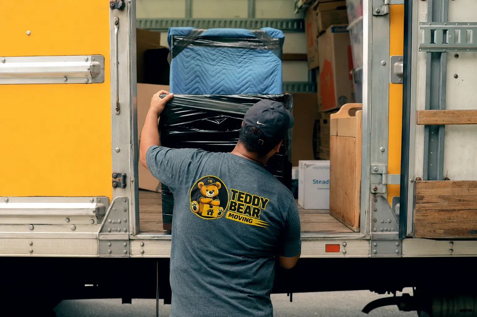 Teddy Bear Moving crew loading the truck