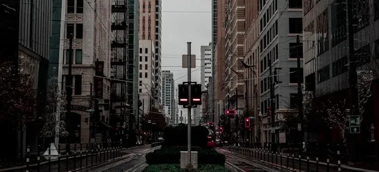 Gray downtown street with traffic lights